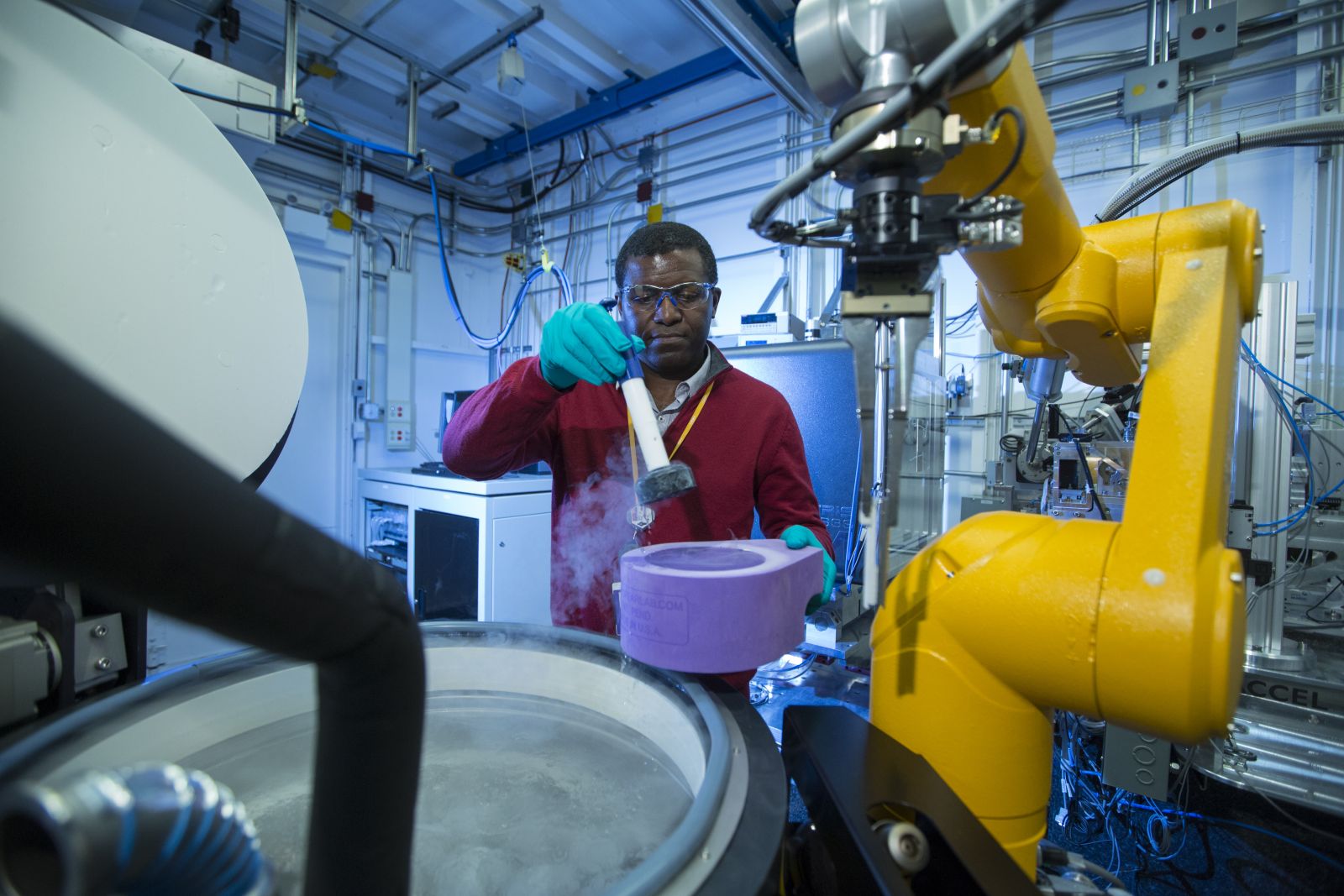 Michel Fodje, Senior Scientist, preparing a sample for imaging at the CMCF beamline at the CLS.