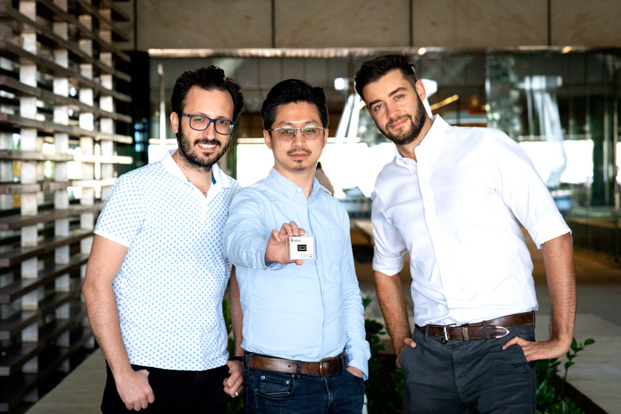 (Left to right) Postdoctoral fellows Erkan Aydin (KAUST), Yi Hou (University of Toronto) and Michele De Bastiani (KAUST) are part of an international team that has designed a new type of tandem solar cell. The device combines industry standard silicon manufacturing with new perovskite technology. (Photo courtesy Andrea Bachofen-Echt / KAUST.)