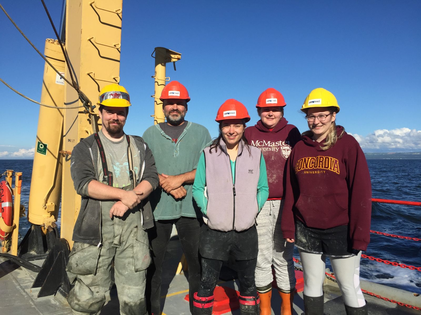 (Left to right) Andrew Barber and Dr. Yves Gélinas with lab members Kathryn Balind, Aleshia Kormendi, and Anic Imfeld onboard the R/V Coriolis II operated by Reformar while on tour in the St. Lawrence Estuary and Gulf, and the Saguenay Fjord. Courtesy of Dr. Gélinas