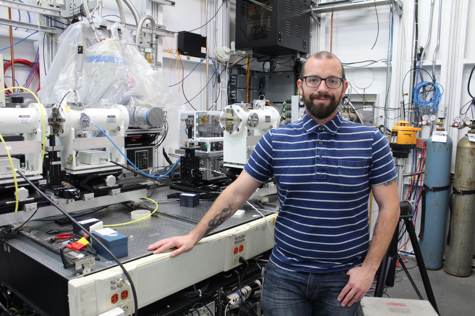Dr. Peter Blanchard, CLS Associate Scientist, standing in the HXMA beamline at the CLS.