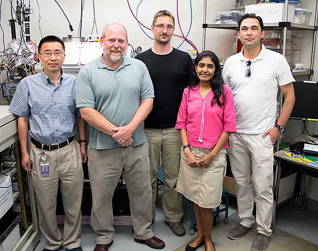 CLS scientists (l-r) Dr. Jian Wang, Garth Wells, Dr. Ferenc Borondics, postdoctoral fellow Dr. Swathi Iyer and University of Saskatchewan physicist Dr. Michael Bradley conduct research on a number of CLS beamlines including Mid-IR, SyLMAND and SM. Other research team members (not shown) are Dr. Scott Payne, Electron Microscopy Center and Dr. Srinivasan Guruvenket, Centre for Nanoscale Science and Engineering.