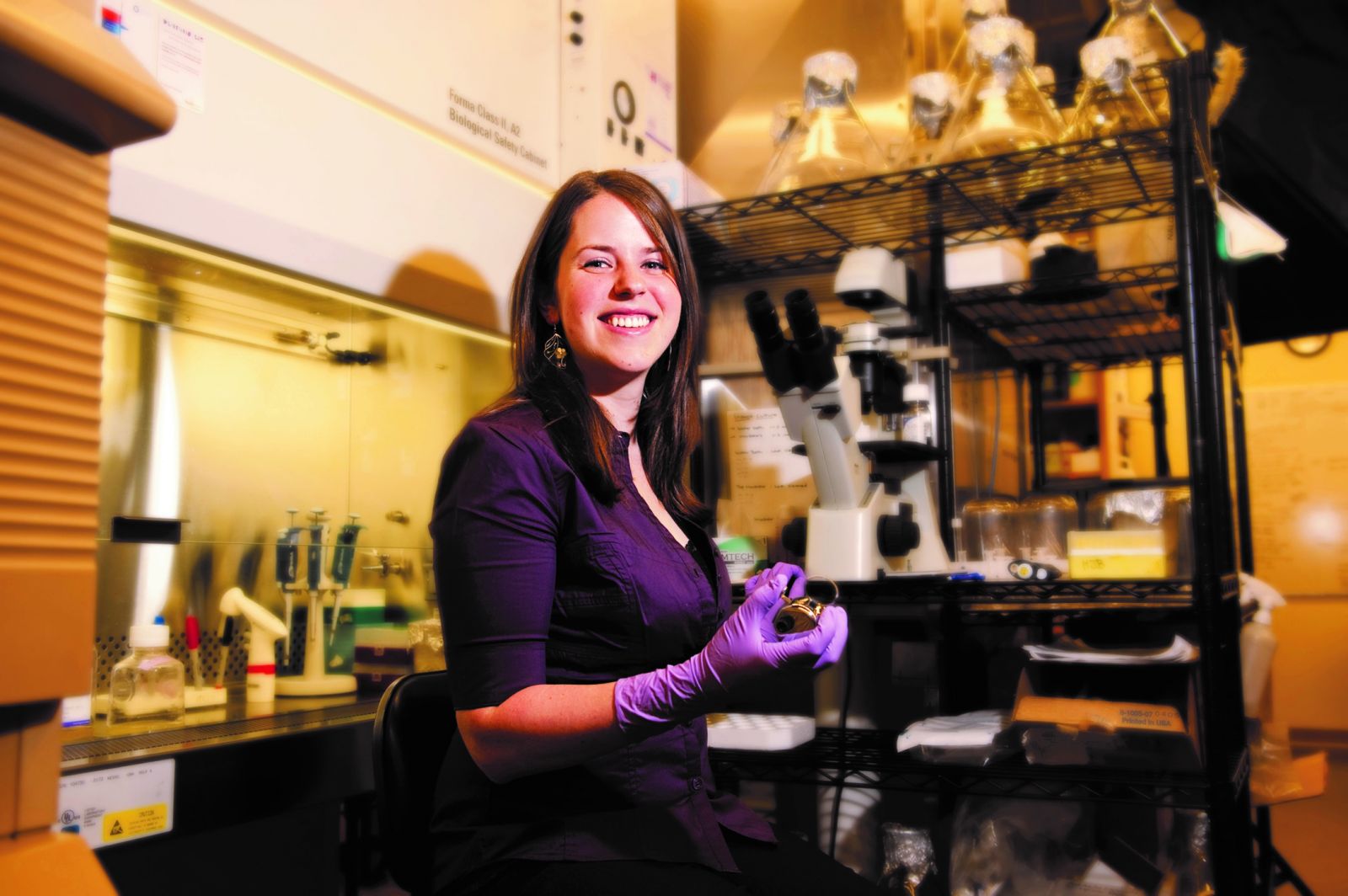 Dr. Michelle (Tonkin) Parker in the lab. Image courtesy University of Victoria. Miura K, Boulanger MJ, Long CA, Narum DL, Miller LH. 2014. Immunization with a functional protein complex required for erythrocyte invasion protects against lethal malaria. Proc Natl Acad Sci USA. Jul 15 111(28): 10311-6.