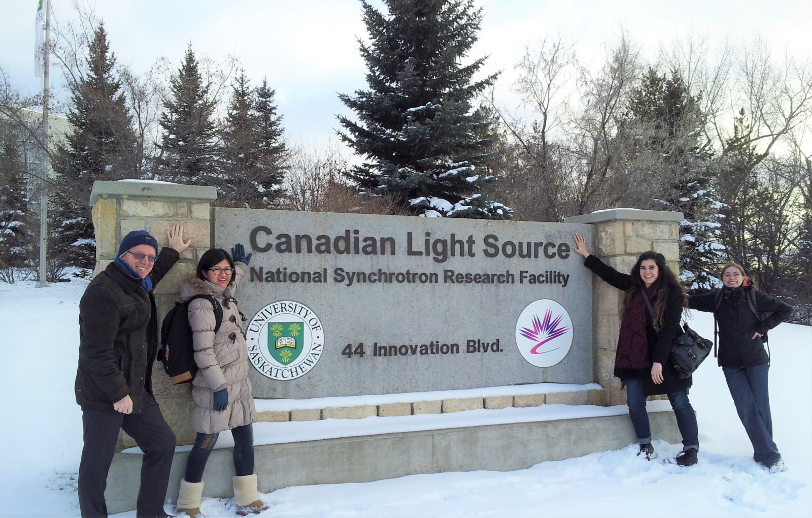 Research team members (left to right) Dr. Martin G. Scanlon, Dr. Xinyang Sun, Dr. Filiz Koksel and Dr. Reine-Marie Guillermic pose outside next to the Canadian Light Source sign.