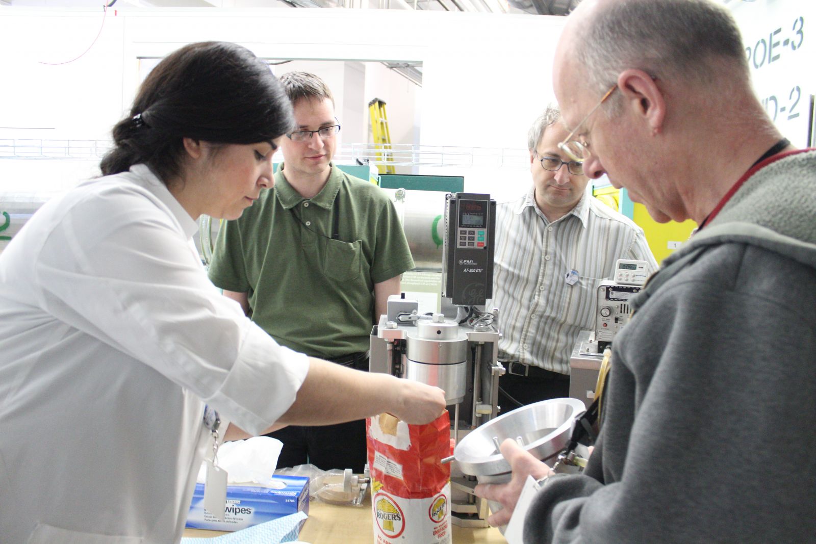 Scientists pour flour at the CLS.