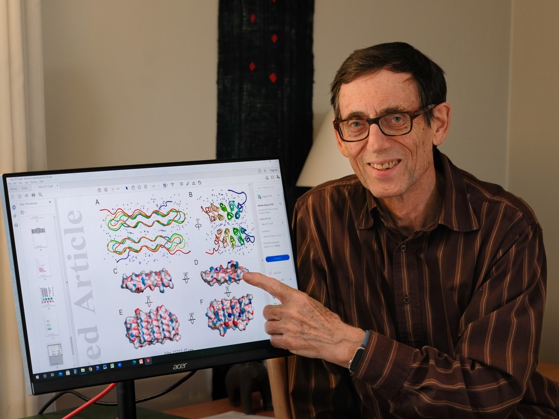 Dr. Peter Davies with snow flea antifreeze protein structure.