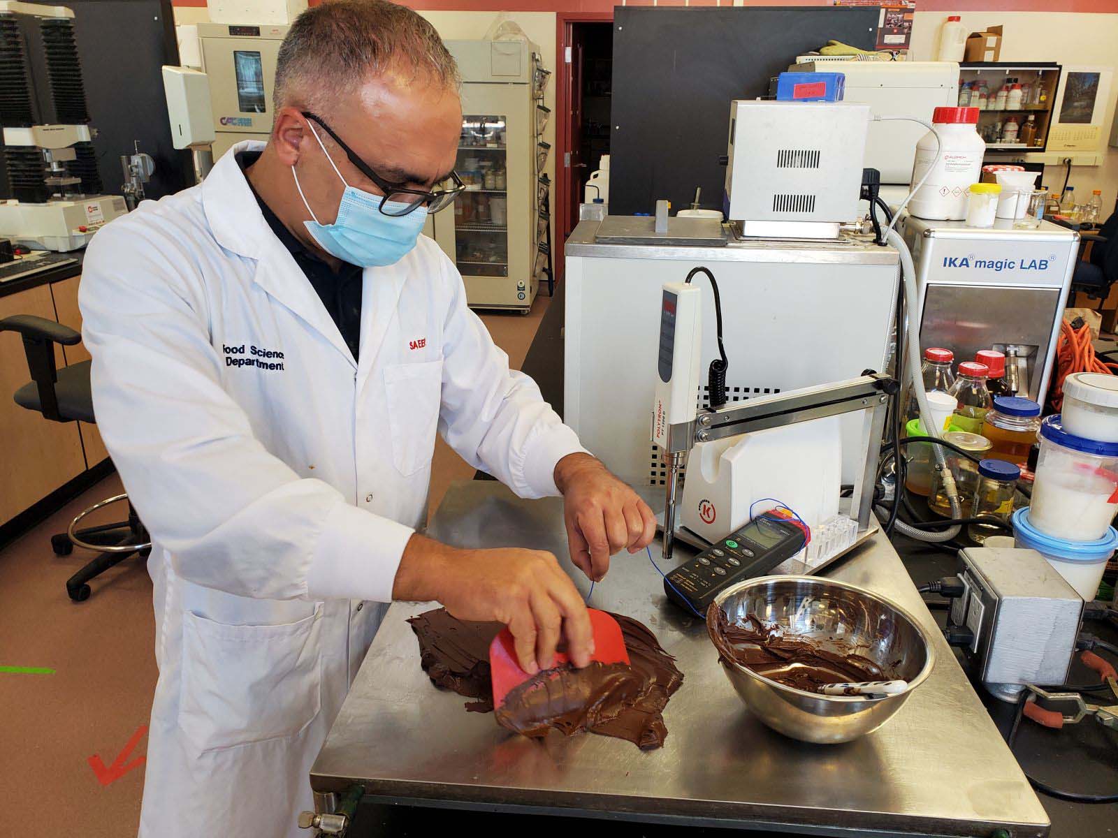 Dr. Saeed Ghazani tempering chocolate. Dept. Food Science University of Guelph.